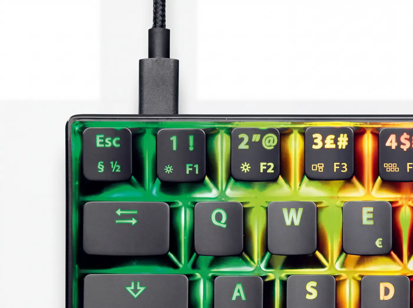 Close-up of the keys on the NOS C-450 Mini Keyboard Pro RGB, a 60% mini layout